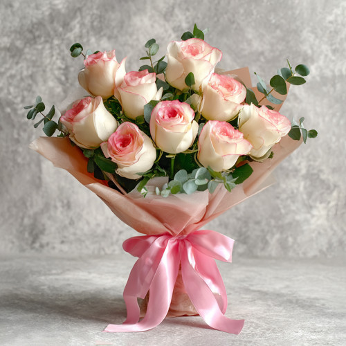 Whispers of Devotion – A Soft Serenade of Jumilia Roses in Blush and Light